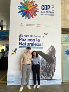 ESA delegation members at COP16 sign. 