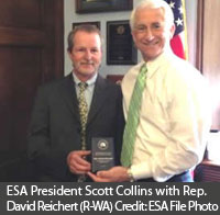 ESA President Collins presents Rep Reichert with BESC Award.jpg