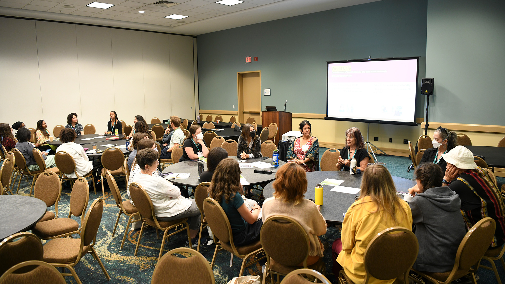 A group of roundtable participants discuss.