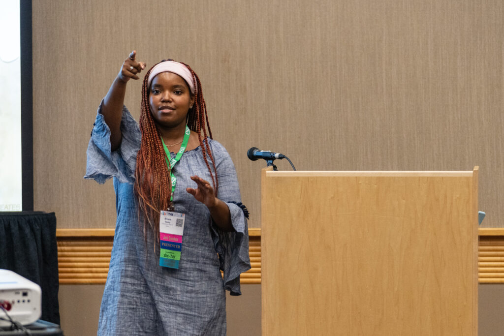 A young woman ecologist calls on an attendee at her talk at the 2023 ESA Annual Meeting