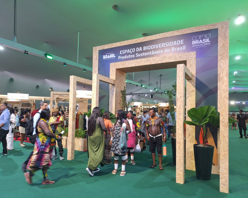 A crowd inside an exhibition hall.