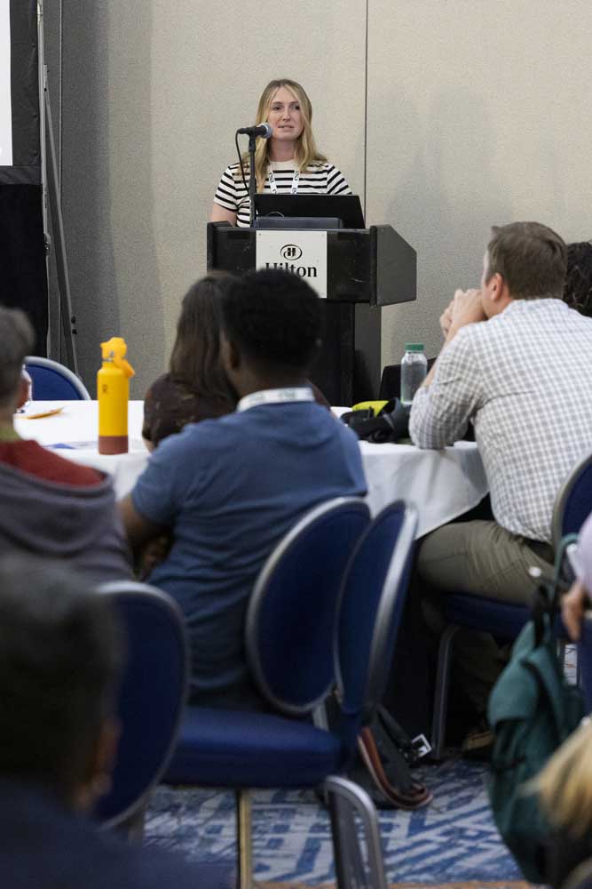 A presenter discusses her video illustration.