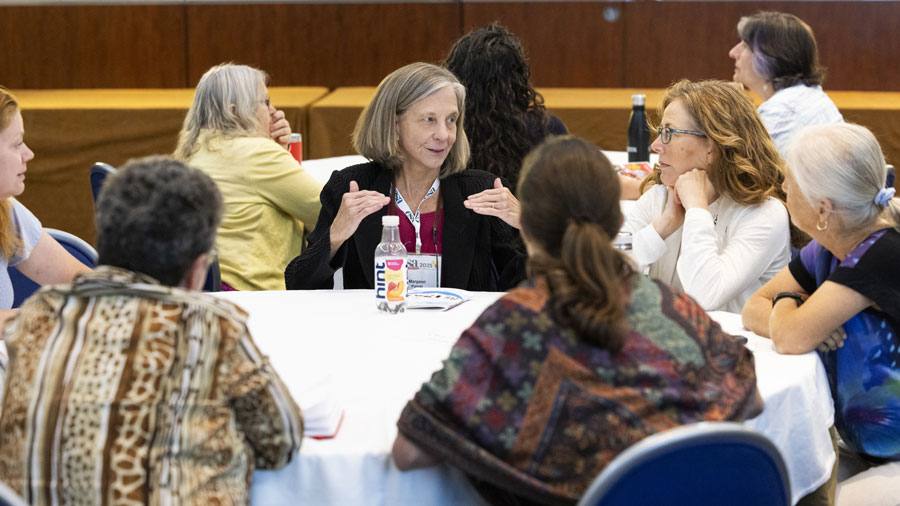 A group continues a discussion.