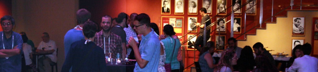 Banner depicting a social event at a bar / restaurant. 