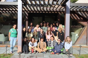 A group of participants pose for a photo together.