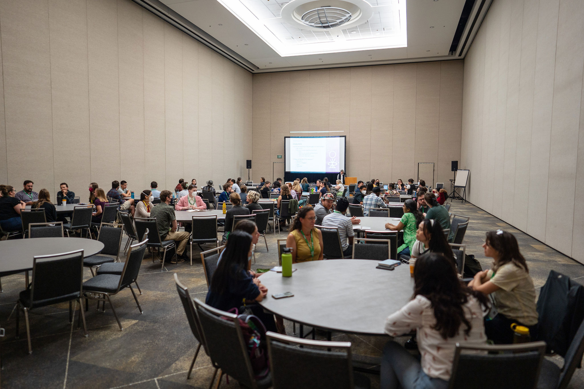 A well lit breakout meeting room.