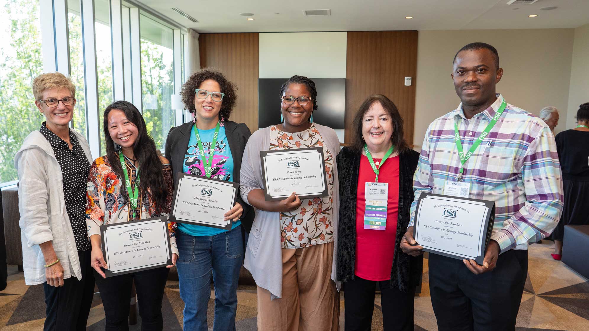 Six ESA awardees smile in a group photo.