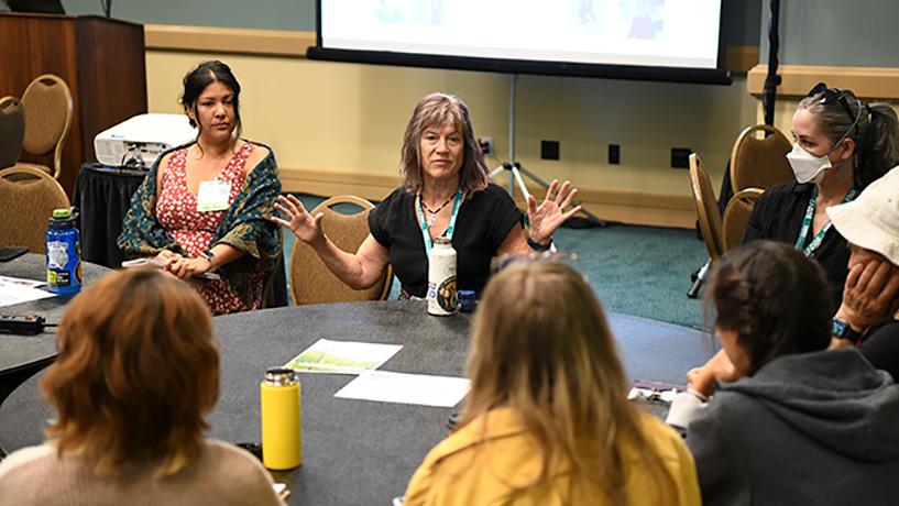 A group meets at a workshop.