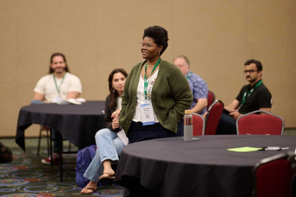 An audience member speaks. 