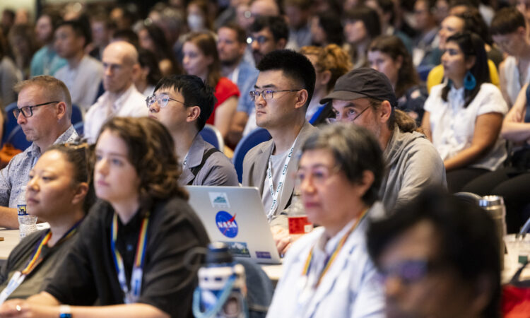 Close-up image of an audience at an ESA annual meeting.
