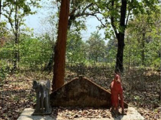 A small shrine in a wooded setting
